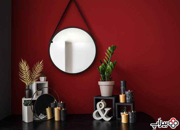 دکوراسیون مدرن با آینه گرد و شمع