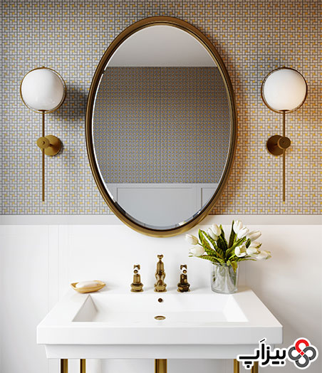آینه گرد قاب طلایی در سرویس بهداشتی